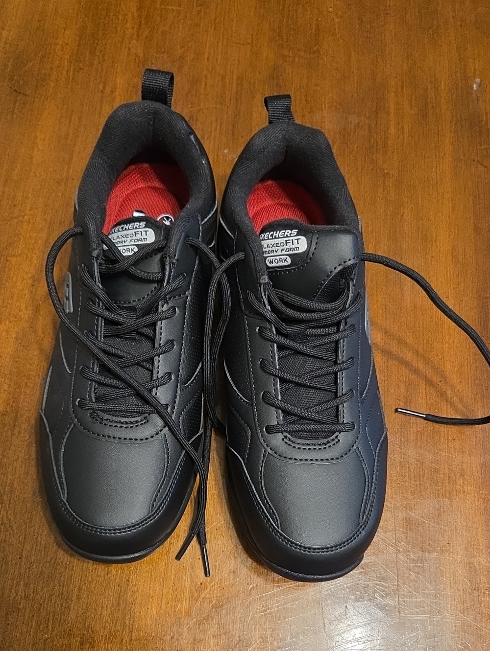 Skechers  Black Sneakers with Red Interior